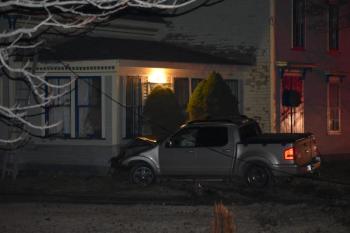 Lines from a utility pole opposite 863 River Road, in St. George, remain attached to a pickup truck around 2 a.m., March 23, 2025. (Photo by Sarah Thompson)