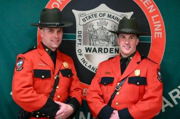 Game Warden of the Year Ethan Buuck (left) and Game Warden Colonel Dan Scott.