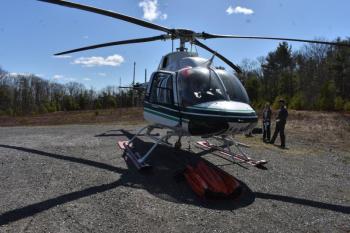 A cargo basket that can be pulled underneath a helicopter. (Photo by Sarah Thompson)