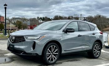 Acura’s smaller, two-row SUV, the RDX, received a mid-cycle update for 2025, including this distinctive grille. The RDX shares a platform with the Honda CR-V ute and the Civic sedan, but there is little resemblance. Our range-topping A-Spec ADV model, here shown, has a sticker price of $56,400. This color is Urban Gray Pearl. Acura’s smaller, two-row SUV, the RDX, received a mid-cycle update for 2025, including this distinctive grille. The RDX shares a platform with the Honda CR-V ute and the Civic sedan, but there is little resemblance. Our range-topping A-Spec ADV model, here shown, has a sticker price of $56,400. This color is Urban Gray Pearl.