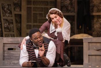 Michael Sumuel as Figaro and Olga Kulchynska as Susanna in Mozart's "Le Nozze di Figaro." (Photo by Evan Zimmerman / Met Opera)