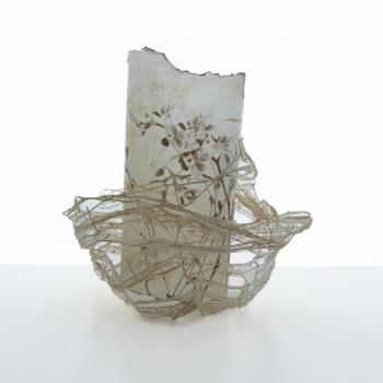 Mutual Presence by Karen Olson, Pigment print on Kozo paper, Himalayan Balsam lace paper, beeswax, linen cord, 5 x 5 x 4”. (Photo courtesy Local Color Gallery)