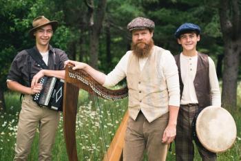Alex Bigney and his sons, who will accompany some of the music selections. (Photo courtesy Rockland Public Library)