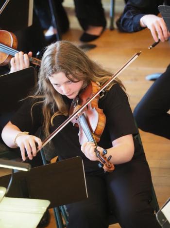 Sophia Grassi, violin, Mozart Mentors Orchestra. (Photo by Marti Stone)