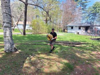 (Photo by Sarah Shepherd) Carrying hose