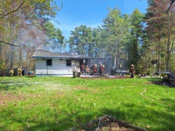 The house located at 325 West Street was heavily damaged by a fast- moving fire on May 13 that began around 12 p.m. (Photo by Sarah Shepherd) Smoke