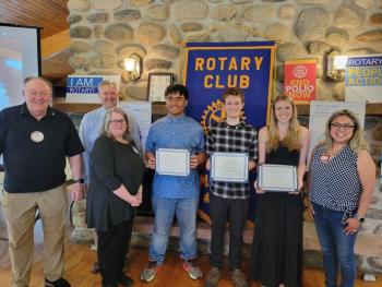 L-R: Rockland Rotarian Scholarship Committee members Kermit Voncannon; Eric Hebert; Scholarship Chairperson Marci Lambert;  scholarship recipients Joshua Placides, Owen Post, Reese Novicka; and Elba-Gloria Rangel-Erazo. (Photo courtesy Rockland Rotary)