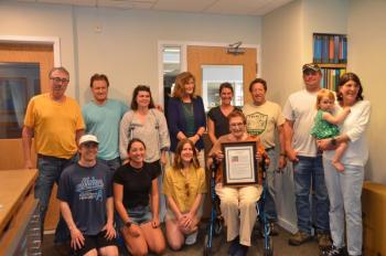 The family of James Annis, with his wife, Linda, seated in the center; children Elizabeth, Becky and Patrick, their spouses and children and grandchildren, and gathered at the Rockport Town Office May 30 to honor the memory of Jim, who was honored in the 2025 Annual Rockport Town Report. Back left to right: Paul Boetsch , Finn Bradenday, Abby Annis, Elizabeth Boetsch, Becky Johnson, Parker Johnson, Patrick Annis, Norah Bradenday, and Kerry Keefe. Front row left to right: James Annis, Alley Johnson, Hannah Berta, and Linda Annis.
(Photo by Lynda Clancy) c