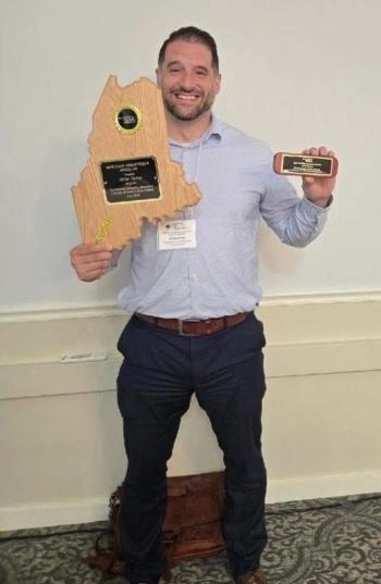 Mike Felton and his award for outstanding educational leadership and dedication to Maine’s children. (Photo courtesy Kristin Falla)