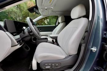 A loaded Ioniq 5 very nearly qualifies as a luxury car. Note the extendable footrest; the passenger front seat has one too. Both front seats also recline—perhaps for a quick nap while the car is plugged in at a charging station on the highway. A loaded Ioniq 5 very nearly qualifies as a luxury car. Note the extendable footrest; the passenger front seat has one too. Both front seats also recline—perhaps for a quick nap while the car is plugged in at a charging station on the highway.