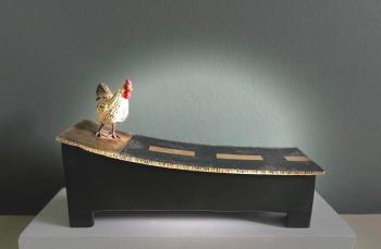 Raymond Mathis, Why Did The Chicken Cross The Road, stash box,  bronze, steel, and vintage toy. (Photo courtesy Salt Pond Studio)