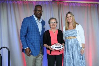 Patriots Pro Football Hall of Famer Andre Tippett (far left) and Gillette’s VP of Communications & Community Affairs, Global Grooming, Kara Buckley congratulate Cheryl Ramsay from NAMI Maine for being selected as a 2025 Myra Kraft Community MVP Award winner. During the June 3 luncheon, the Kraft family, the Patriots Foundation and Gillette awarded $275,000 in grants to 26 New England nonprofits. NAMI Maine received a $10,000 grant in honor of Cheryl’s volunteer efforts. (Photo courtesy Eric J. Adler/New England Patriots) Patriots Pro Football Hall of Famer Andre Tippett (far left) and Gillette’s VP of Communications & Community Affairs, Global Grooming, Kara Buckley congratulate Cheryl Ramsay from NAMI Maine for being selected as a 2025 Myra Kraft Community MVP Award winner. During the June 3 luncheon, the Kraft family, the Patriots Foundation and Gillette awarded $275,000 in grants to 26 New England nonprofits. NAMI Maine received a $10,000 grant in honor of Cheryl’s volunteer efforts. (Photo courtesy Eric J. Adler/New Eng