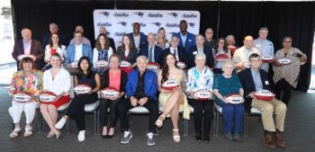 Patriots Chairman and CEO Robert Kraft, Patriots Executive Director of Community Affairs Andre Tippett and Procter & Gamble’s VP of Communications & Community Affairs, Global Grooming, Kara Buckley take a group photo with the 2025 Myra Kraft Community MVP Award winners at Gillette Stadium. (Photo courtesy Eric J. Adler/New England Patriots) Patriots Chairman and CEO Robert Kraft, Patriots Executive Director of Community Affairs Andre Tippett and Procter & Gamble’s VP of Communications & Community Affairs, Global Grooming, Kara Buckley take a group photo with the 2025 Myra Kraft Community MVP Award winners at Gillette Stadium. (Photo courtesy Eric J. Adler/New England Patriots)