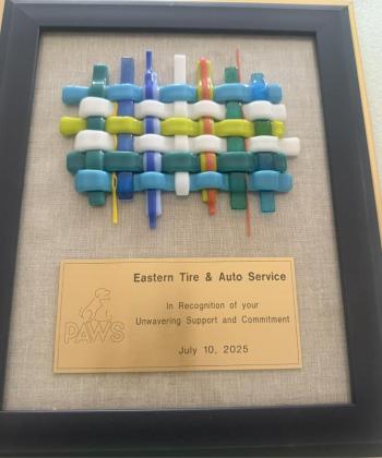 Eastern Tire award. (Photo courtesy PAWS Animal Adoption Center)