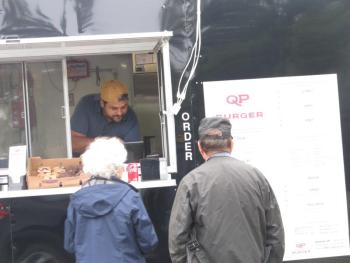 Chef Mike serving customers. (Photo by Kay Stephens)