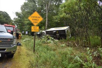 A box truck from the insulation division of a building company landed on its side just inside Knox County, a few feet up from Washington Auto Parts. (Photo by Sarah Thompson)