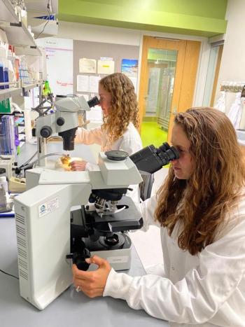Alicyn Smart (left), director of Extension’s Plant Disease Diagnostic Lab, and Stephanie Shea, assistant diagnostician. (Photo courtesy University of Maine Cooperative Extension)