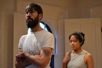 Michael Amico (Eli) and Jaine Ye (Meiko) share a sorrowful moment. (Photo by Scott Anthony Smith)