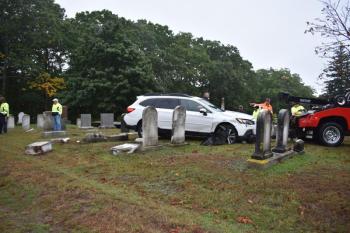 View of car in cemetery