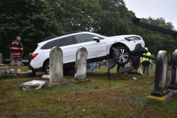 Front of car being raised off the ground