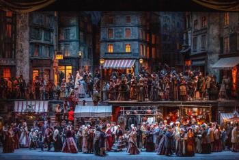 A scene from Act II of Puccini's "La Bohème." (Photo by Evan Zimmerman / Met Opera)
