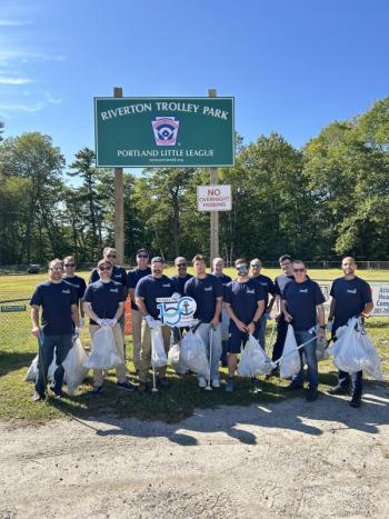 Camden National Bank employees help make the Riverton Trolley Park in Portland a safe and welcoming area during their dedicated Community Well-being Day. (Photo courtesy Camden National Corporation)