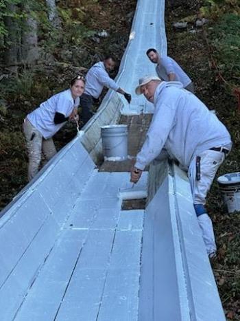 Abe Rhode, Kristi Van Blarcom, Ian Bogey, David Garner paint the toboggan chute with a fresh coat of white paint Oct. 5. (Photo courtesy Peter Berke) Abe Rhode, Kristi Van Blarcom, Ian Bogey, David Garner paint the toboggan chute with a fresh coat of white paint Oct. 5. (Photo courtesy Peter Berke)
