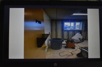 View of a gutted office during a remediation attempt.