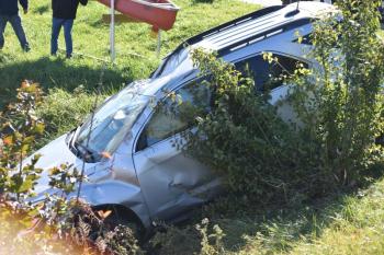 Damage to the vehicle includes a dented-in roof