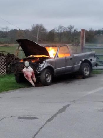 A burning truck sits outside. Photo courtesy Rick Butler
