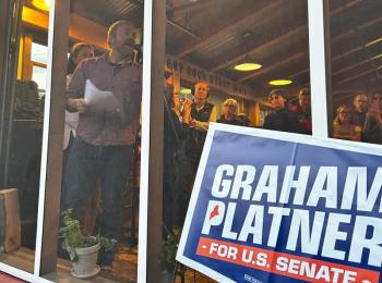 U.S. Senate hopeful Graham Platner, of Sullivan, speaks to a large crowd of citizens who want to know more about his platform and his goals in advance of midterm elections 2026. (Photo by Lynda Clancy)