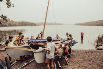 It takes community to launch a boat (Photo courtesy David Garrison)