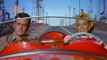 Rock Hudson and Dorothy Malone in a scene from Written On The Wind. (Photo courtesy Strand Theatre) Rock Hudson and Dorothy Malone in a scene from Written On The Wind. (Photo courtesy Strand Theatre)