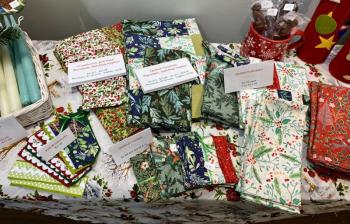 Folded decorative linen on a display table