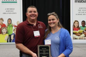 Chris and Tracey Leavitt hold their award. (Photo courtesy Krystle Weaver)