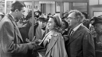 James Stewart, Donna Reed and Thomas Mitchell in It’s a Wonderful Life. (Photo courtesy Strand Theatre)