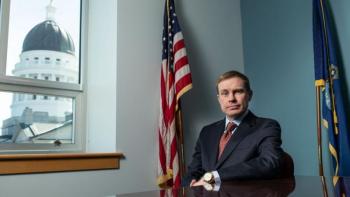 aaron frey poses for a photo