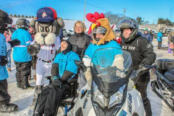 Slugger and some snowmobile riders