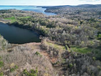 The Rock Road in Rockport runs parallel to Lily Pond from Huse Street in Rockport to Midcoast Solid Waste Transfer Station and toward the intersection of Greenfield Drive and Limerock Street in Camden. 
