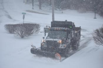 plow truck in storm