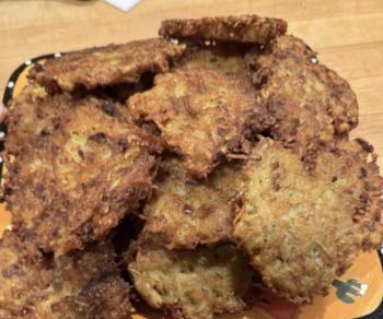 A platter of latkes, awaiting sour cream and homemade applesauce. (Photo by Ed O’Brien)