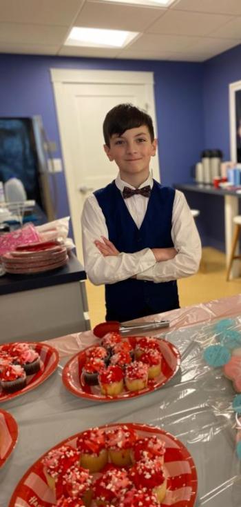 Finn Miller as waiter