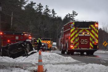 Incident scene showing caution road sign