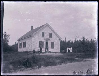 Black and white picture of a schoolhouse