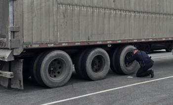 inspecting the tires
