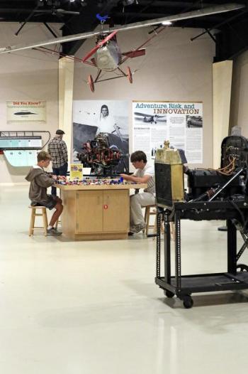 Older kids working at a table