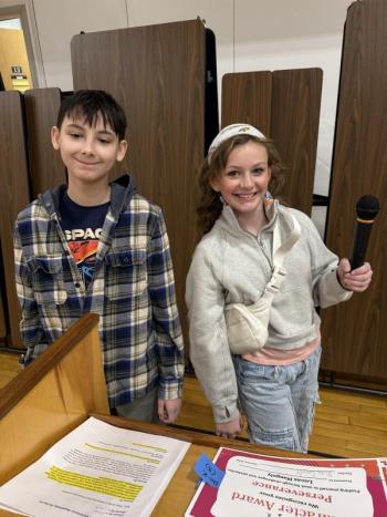 Boy and girl with microphone