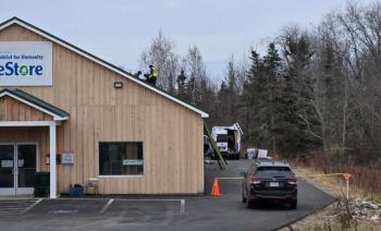 Ground view of people on roof