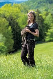 Woman holding a lamb