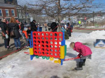 Kid-friendly games were throughout the town. Photo by Kay Stephens